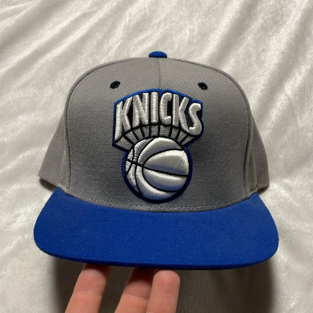 Blue and grey NY Knicks flatbill SnapBack hat. Mitchell and Ness brand.